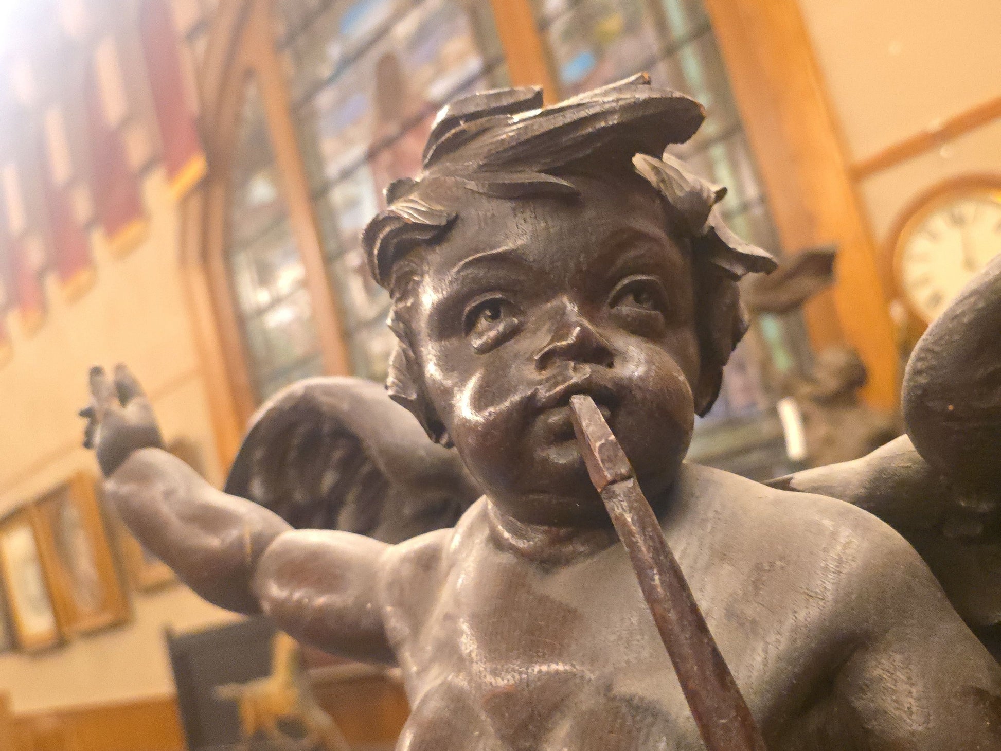 Antique Hand-Carved Wooden Winged Putto Cherub Figure Playing a Pipe