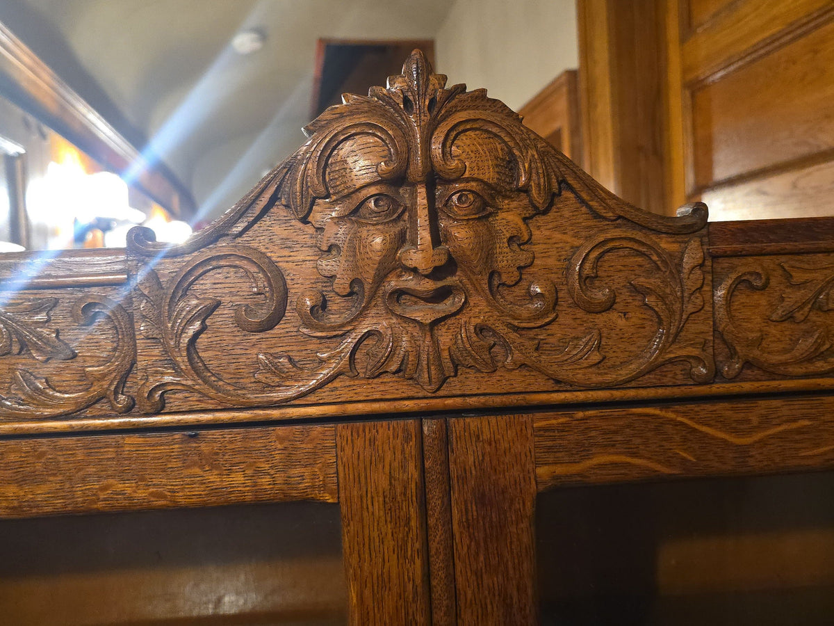 Antique Carved Oak Green Man Two-Door Glass Front Bookcase with Key