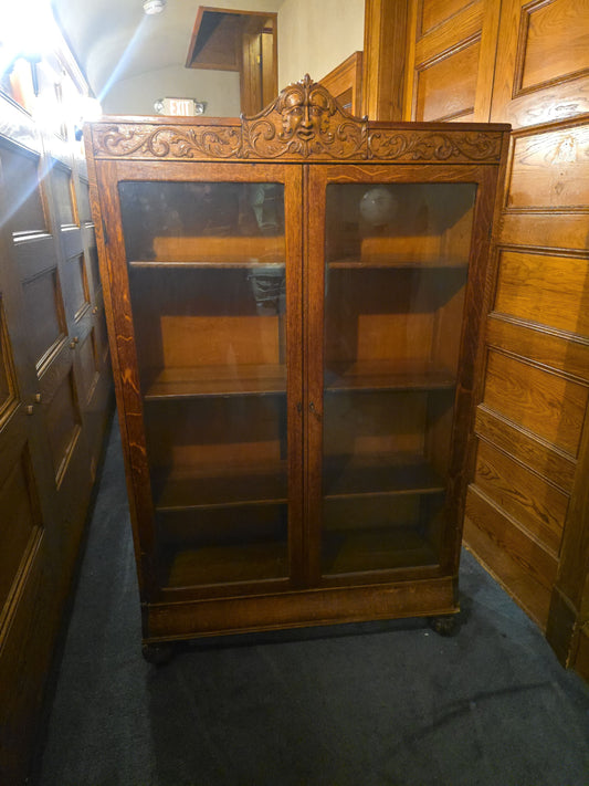Antique Carved Oak Green Man Two-Door Glass Front Bookcase with Key