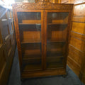 Lot 014 - Antique Carved Oak Green Man Two-Door Glass Front Bookcase with Key, 40-1/2" L x 15" W x 65" H