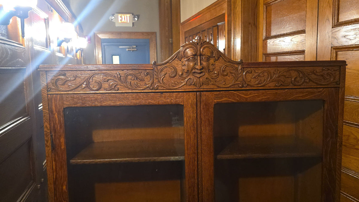 Antique Carved Oak Green Man Two-Door Glass Front Bookcase with Key