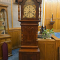 Lot 019 - Antique Tall Case Grandfather Clock with Hand-Painted Dial Titled "Leading the Way", 24" L x 12" W x 88" H