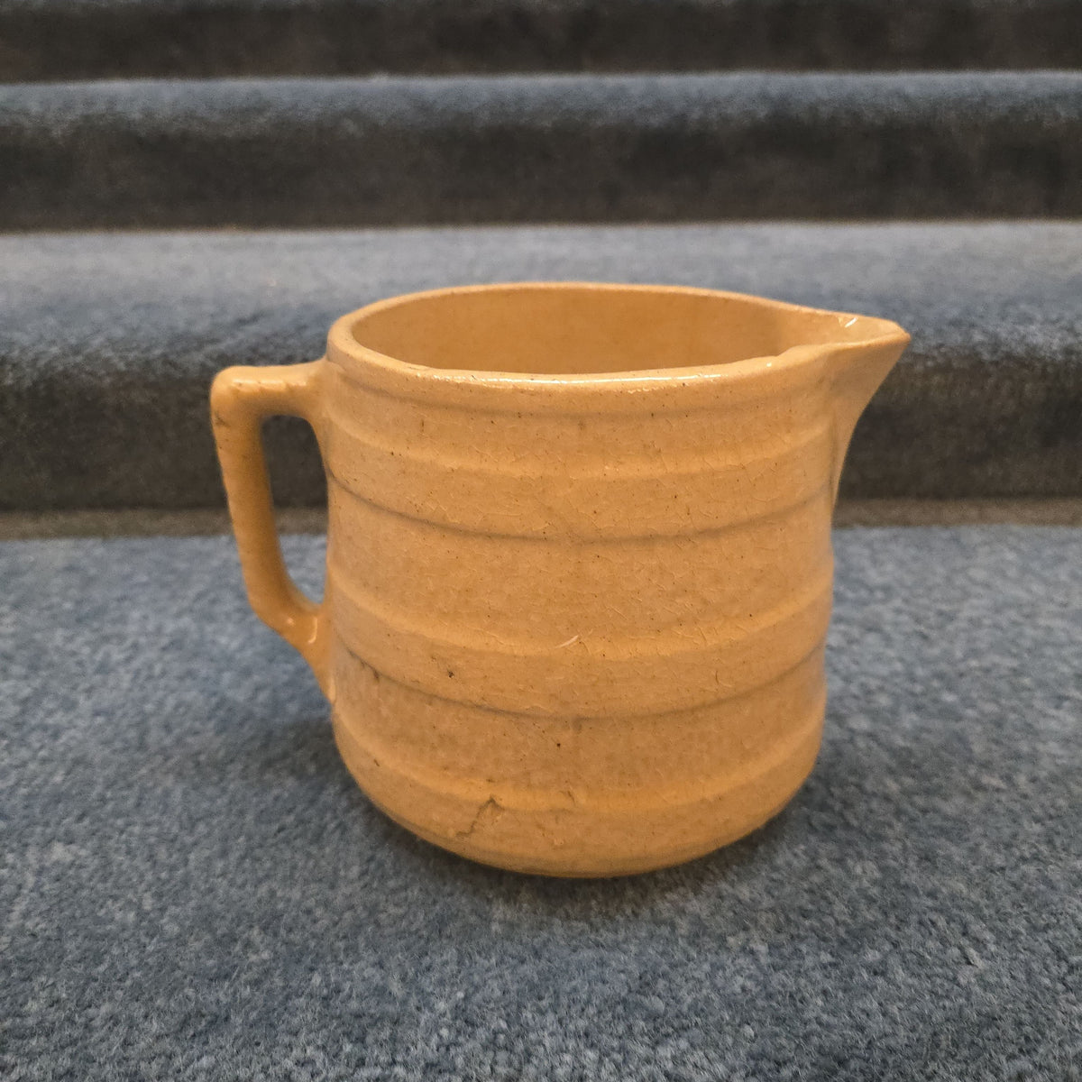 Antique Stoneware Pitcher with Floral Decoration