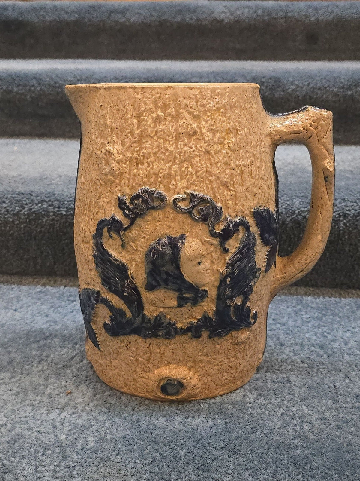Antique Stoneware Pitcher with Applied Cobalt Griffin and Rose Decoration