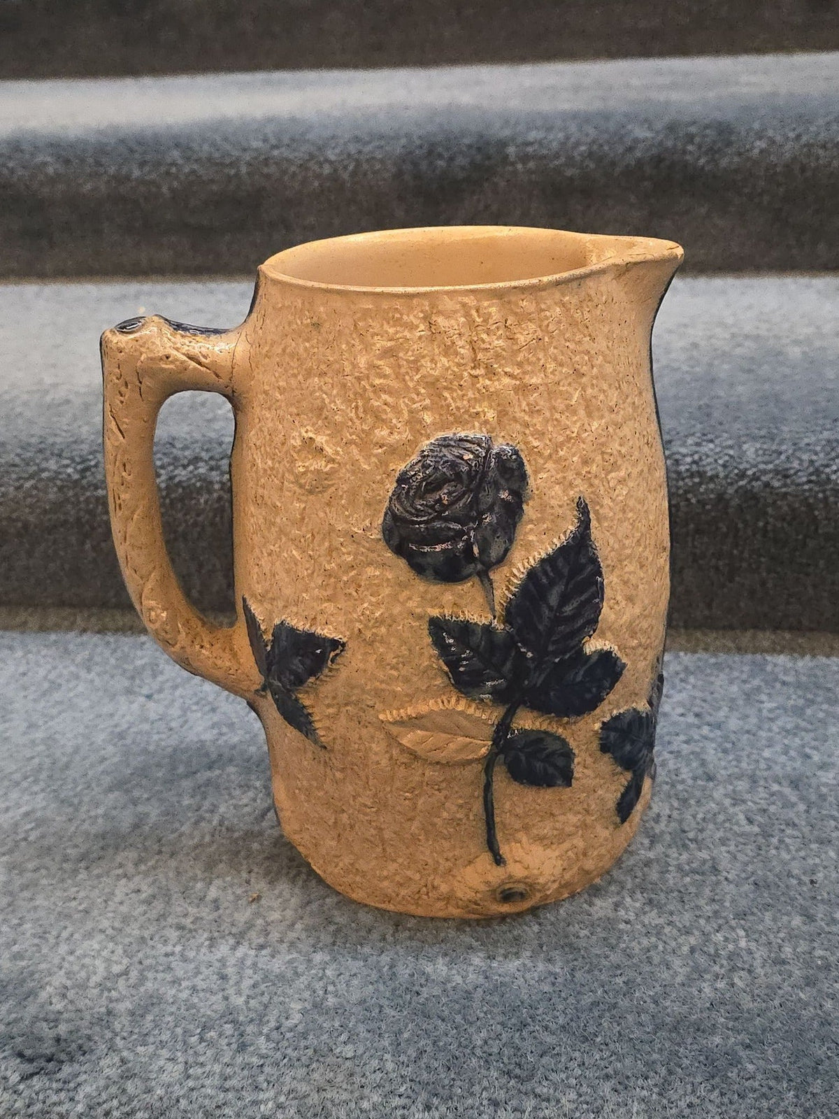 Antique Stoneware Pitcher with Applied Cobalt Griffin and Rose Decoration