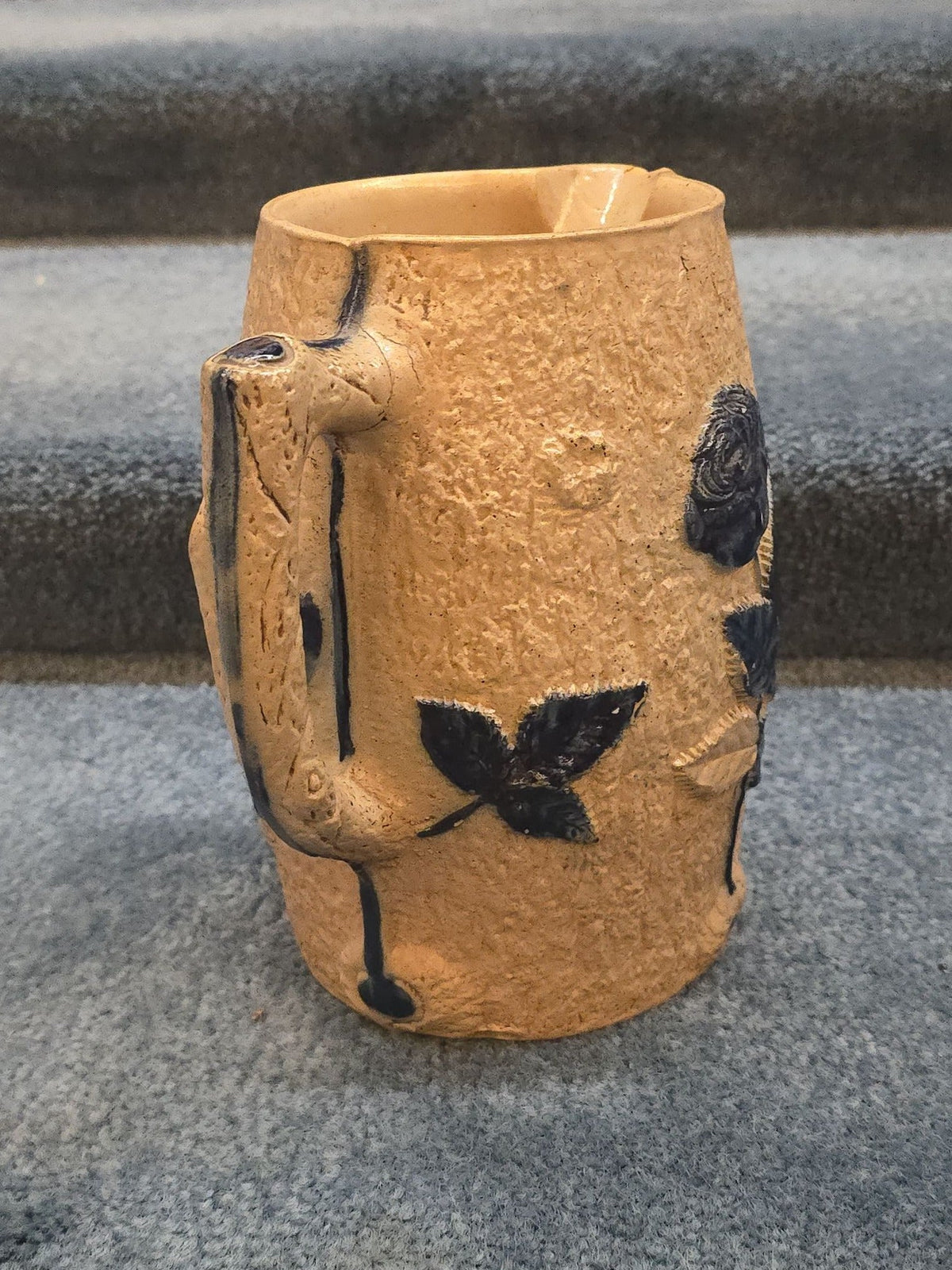 Antique Stoneware Pitcher with Applied Cobalt Griffin and Rose Decoration