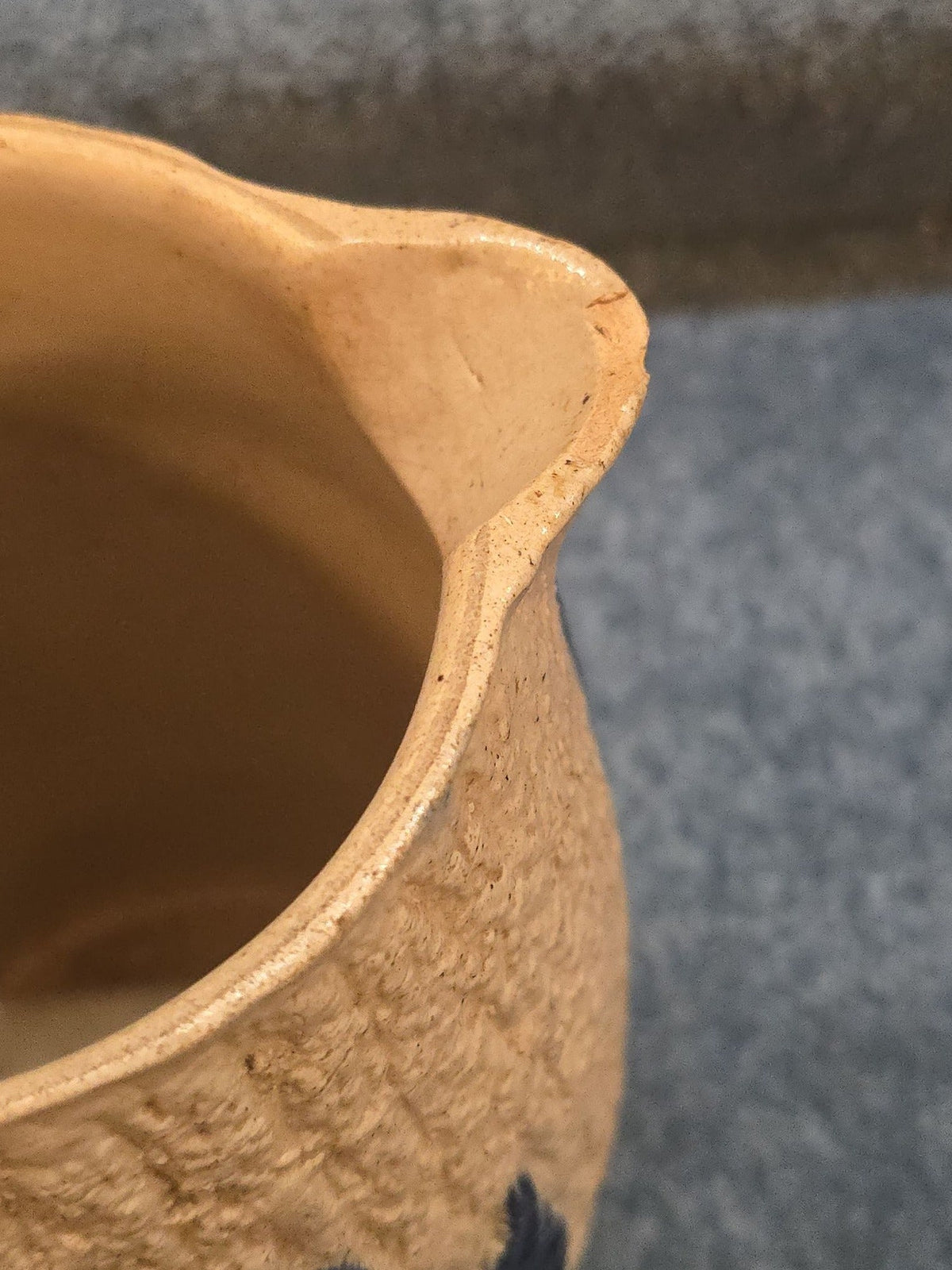 Antique Stoneware Pitcher with Applied Cobalt Griffin and Rose Decoration