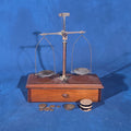 Lot 114 - Antique Apothecary Balance Scale with Weights, Manufactured by Henry Troemner, Philadelphia, Pennsylvania, 9" L x 10" H