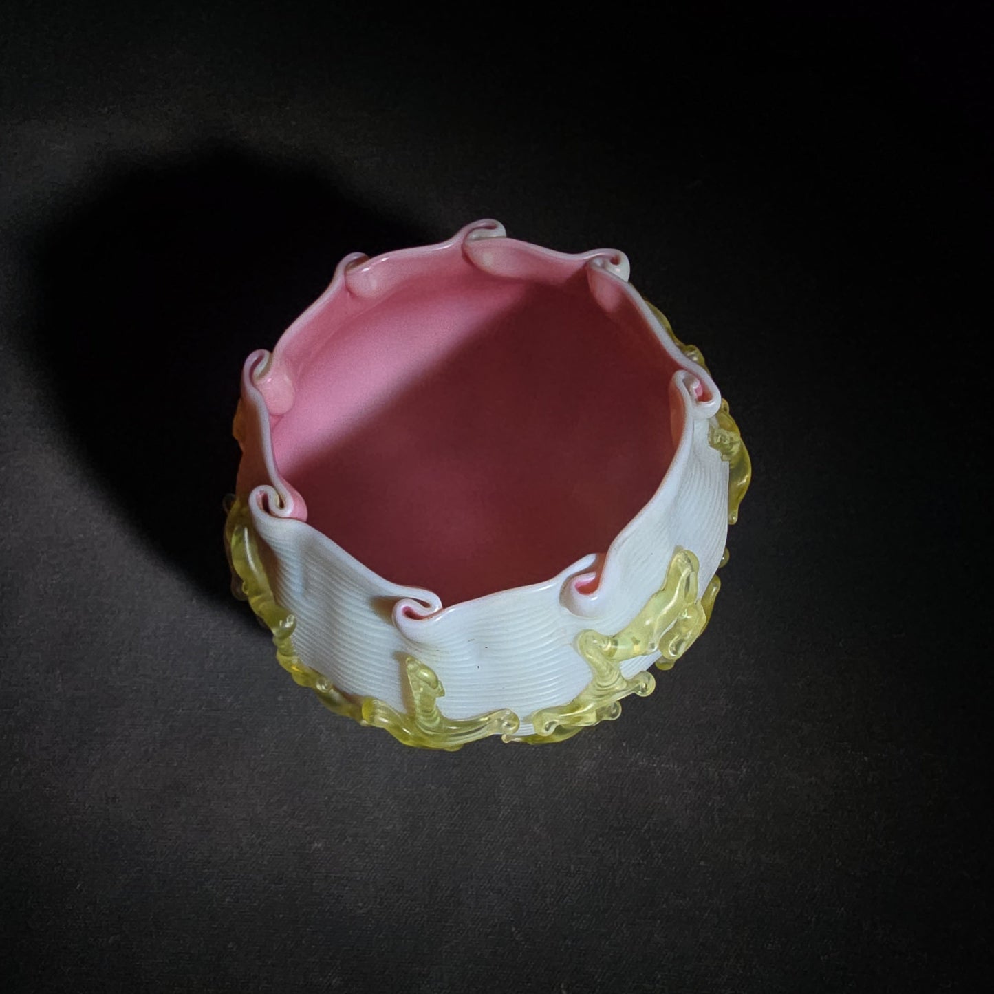 Antique Early 20th Century Uranium Art Glass Bowl with Pink Interior, Applied Glass Coral Decoration, and Crimped Rim, UV Reactive