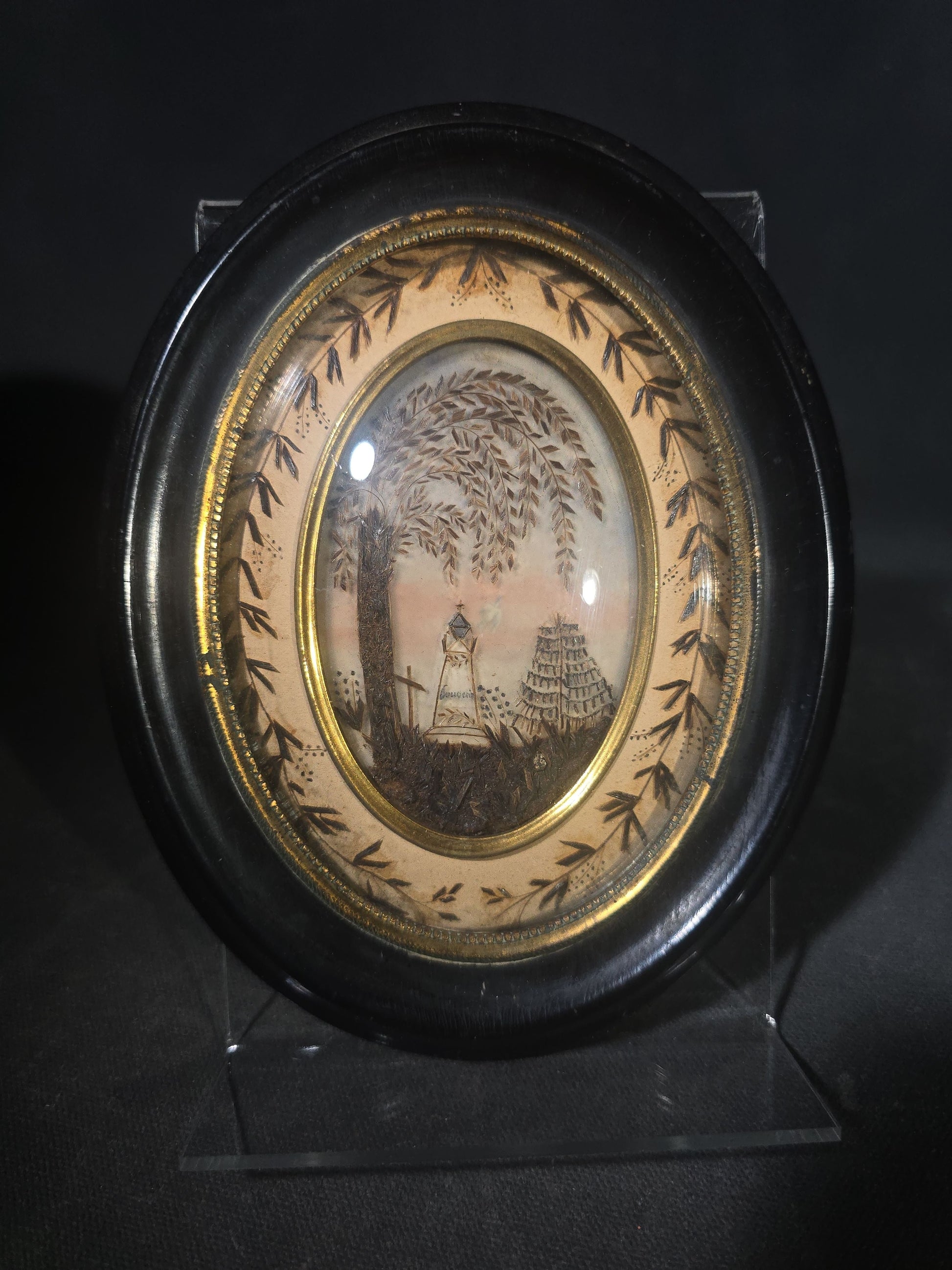 Pair of Antique French Hair Work Mourning Palettes Under Glass in Oval Black Frames including Graveyard Scene Inscribed "Souvenir" and Photograph Portrait of a Young Woman
