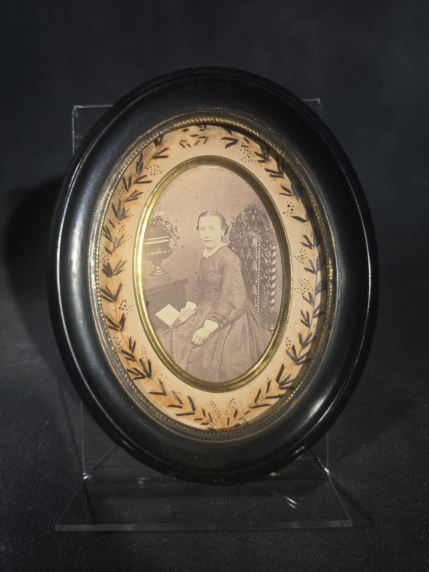 Pair of Antique French Hair Work Mourning Palettes Under Glass in Oval Black Frames including Graveyard Scene Inscribed "Souvenir" and Photograph Portrait of a Young Woman