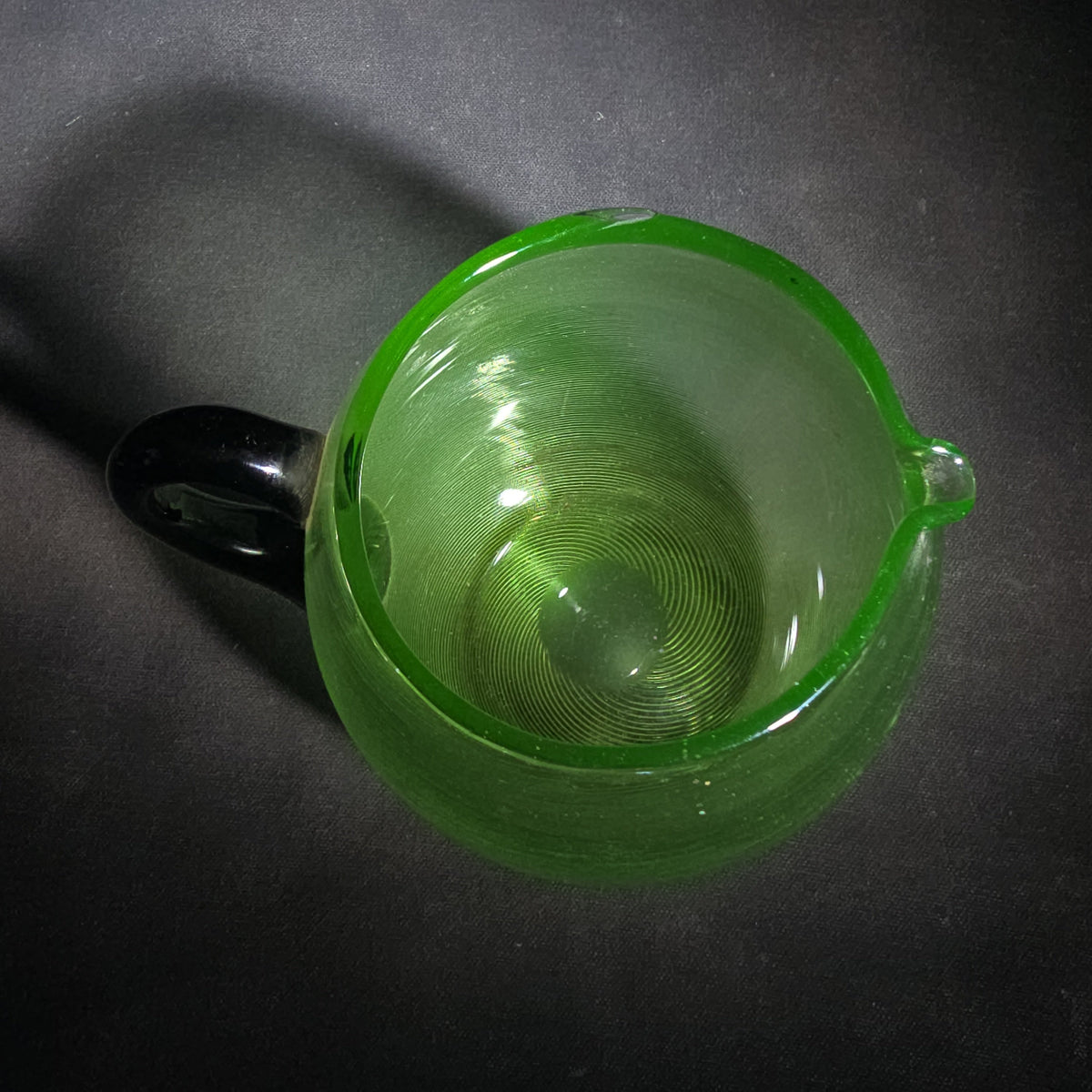 Vintage Hand-Blown Green Uranium Glass Pitcher with Applied Black Handle, UV Reactive