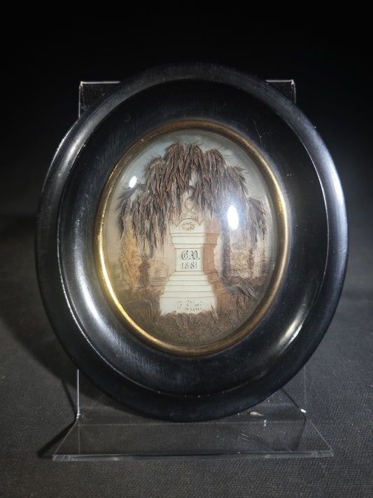 Antique French Hair Work Mourning Palette with Weeping Willow and Funerary Monument, Initialed "G.V." and Dated 1881, "17 Mai" ("May 17"), Oval Black Frame with Convex Glass