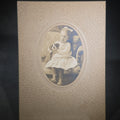 Lot 010 - Antique Board-Mounted Photograph of a Young Girl Holding a Puppy, Photographed by Steele, South Deerfield, Massachusetts
