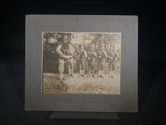 Antique Board-Mounted Photograph of Six WWI-Era Soldiers with Rifles During Inspection