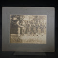 Lot 011 - Antique Board-Mounted Photograph of Six WWI-Era Soldiers with Rifles During Inspection