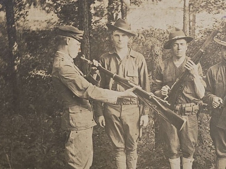 Antique Board-Mounted Photograph of Six WWI-Era Soldiers with Rifles During Inspection