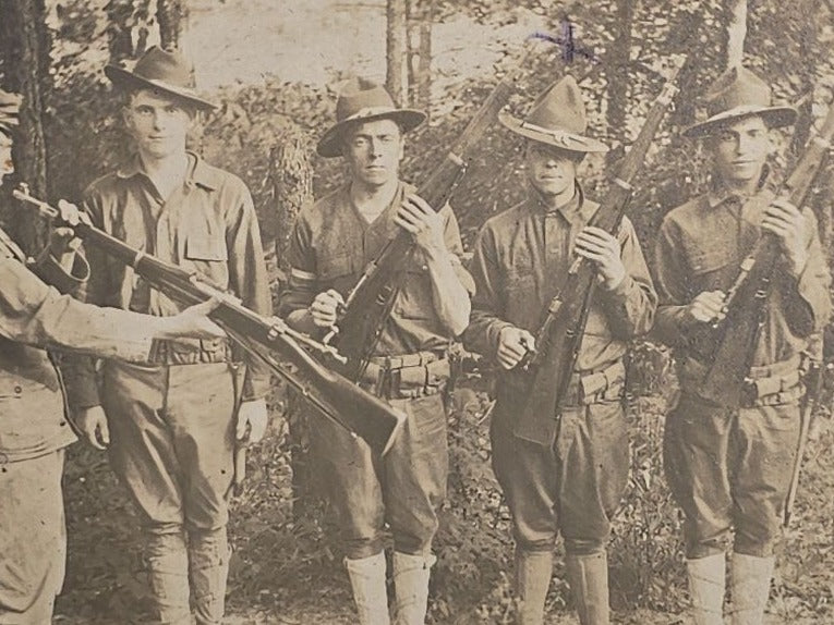 Antique Board-Mounted Photograph of Six WWI-Era Soldiers with Rifles During Inspection