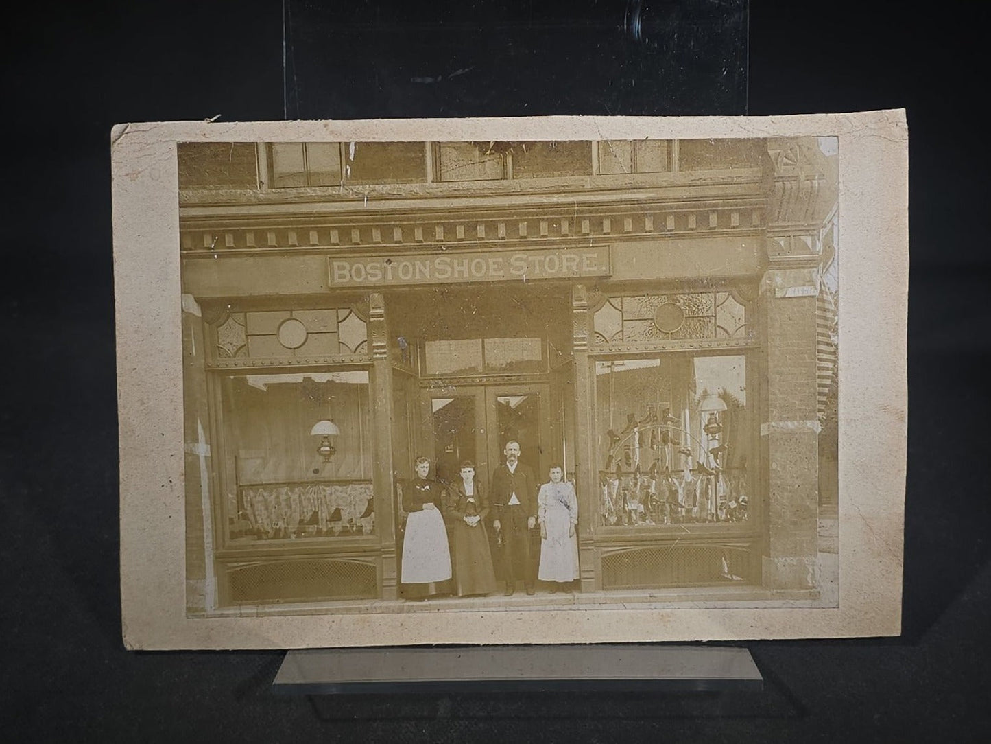 Antique Cabinet Card Occupational Photograph of "Boston Shoe Store" Storefront with Staff Posed in Entrance and Shoe Window Displays