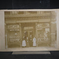 Lot 012 - Antique Cabinet Card Occupational Photograph of "Boston Shoe Store" Storefront with Staff Posed in Entrance and Shoe Window Displays