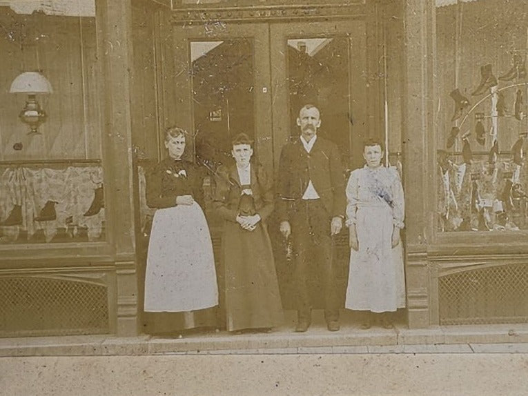 Antique Cabinet Card Occupational Photograph of "Boston Shoe Store" Storefront with Staff Posed in Entrance and Shoe Window Displays