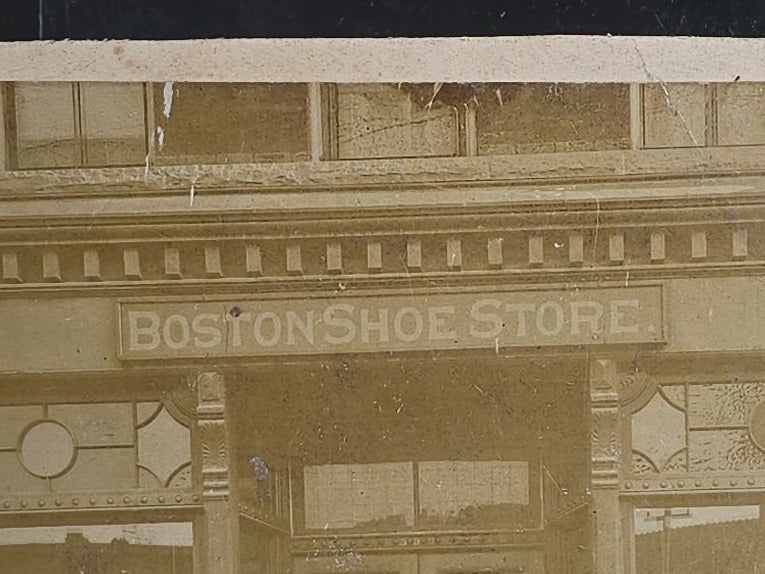 Antique Cabinet Card Occupational Photograph of "Boston Shoe Store" Storefront with Staff Posed in Entrance and Shoe Window Displays