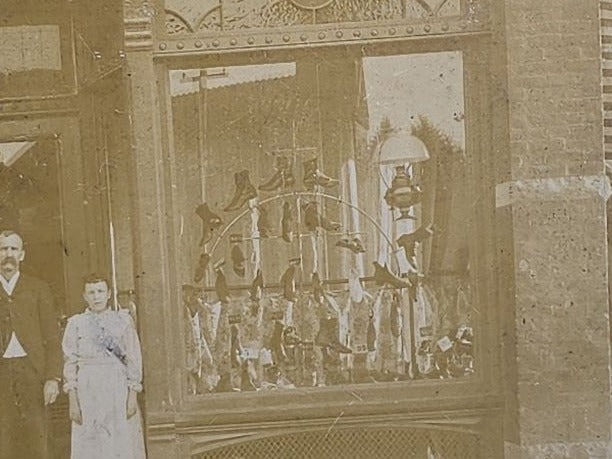 Antique Cabinet Card Occupational Photograph of "Boston Shoe Store" Storefront with Staff Posed in Entrance and Shoe Window Displays