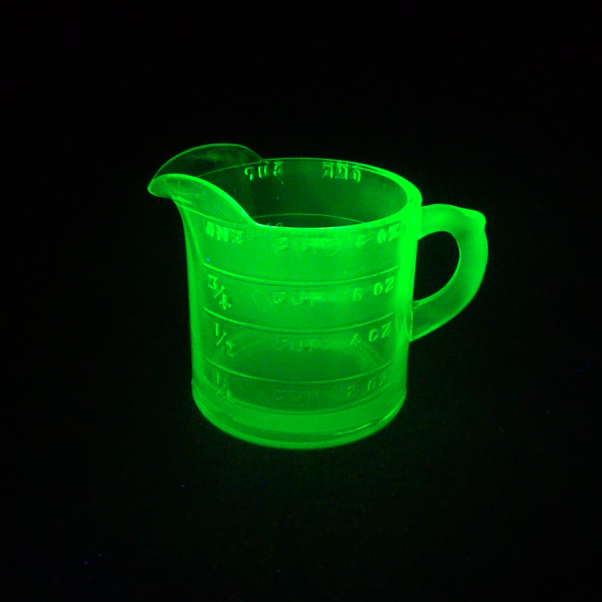 Antique Uranium Glass Spout Measuring Cup with Embossed Graduated Markings, UV Reactive