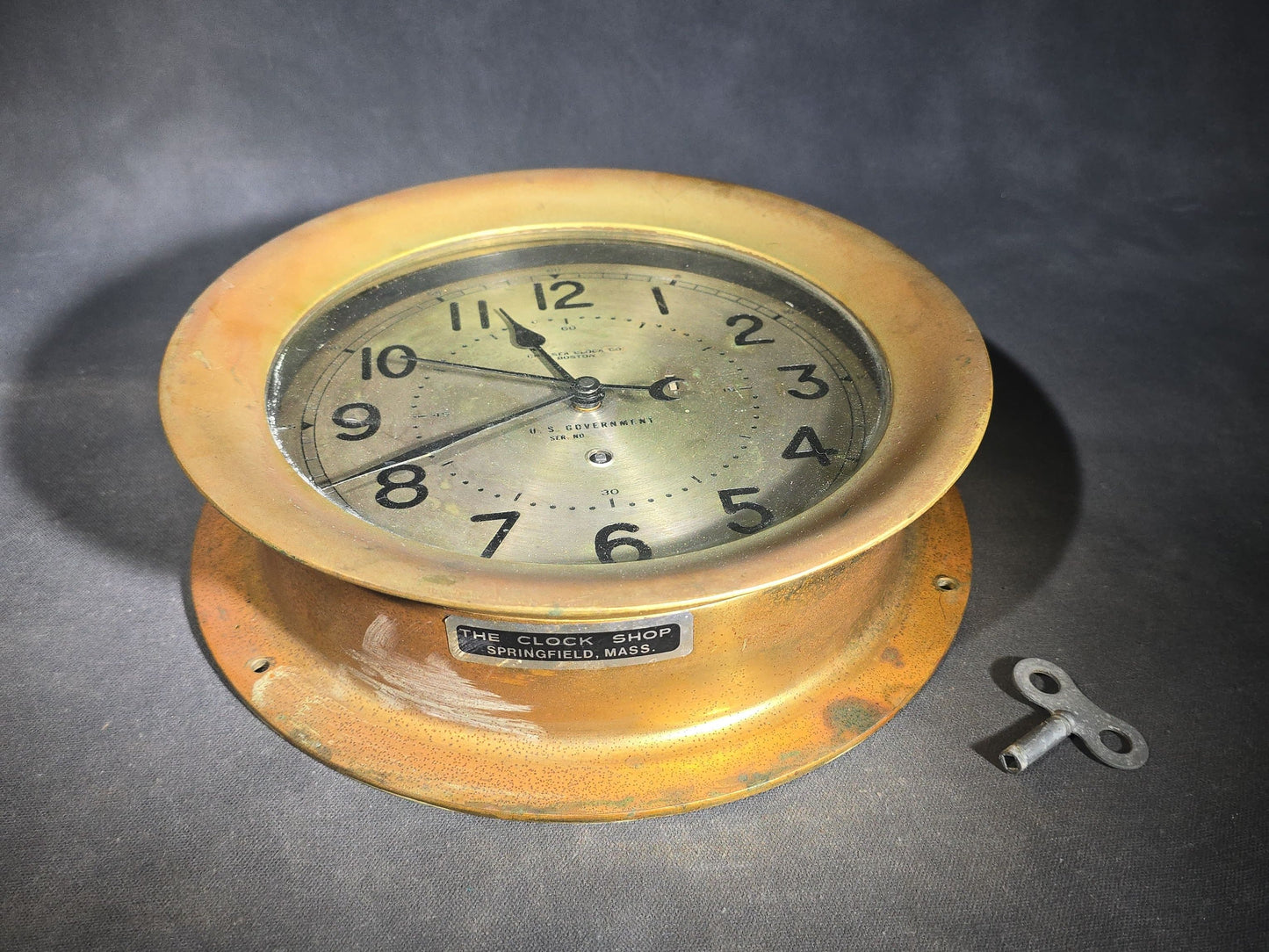 Vintage U.S. Government Ship's Clock in Brass Case with Key, Manufactured by Chelsea Clock Co., Boston, Massachusetts, Serial No. 599500