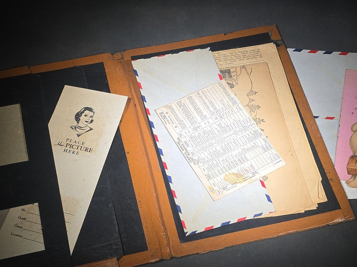 Vintage WWII U.S. Service Writing Kit with Contents including "Armoreader" Camp Polk, Louisiana Newsletter, "The Communique" Newsletter, Chemical Warfare Pocket Reference Card, and Die-Cut Kewpie Christmas Ornaments