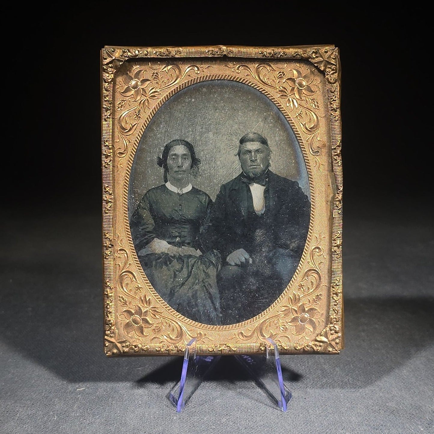 Antique Approximately 1/4th Plate Ruby Ambrotype Photograph of a Seated Couple with Embossed Floral Brass Mat, Uncased