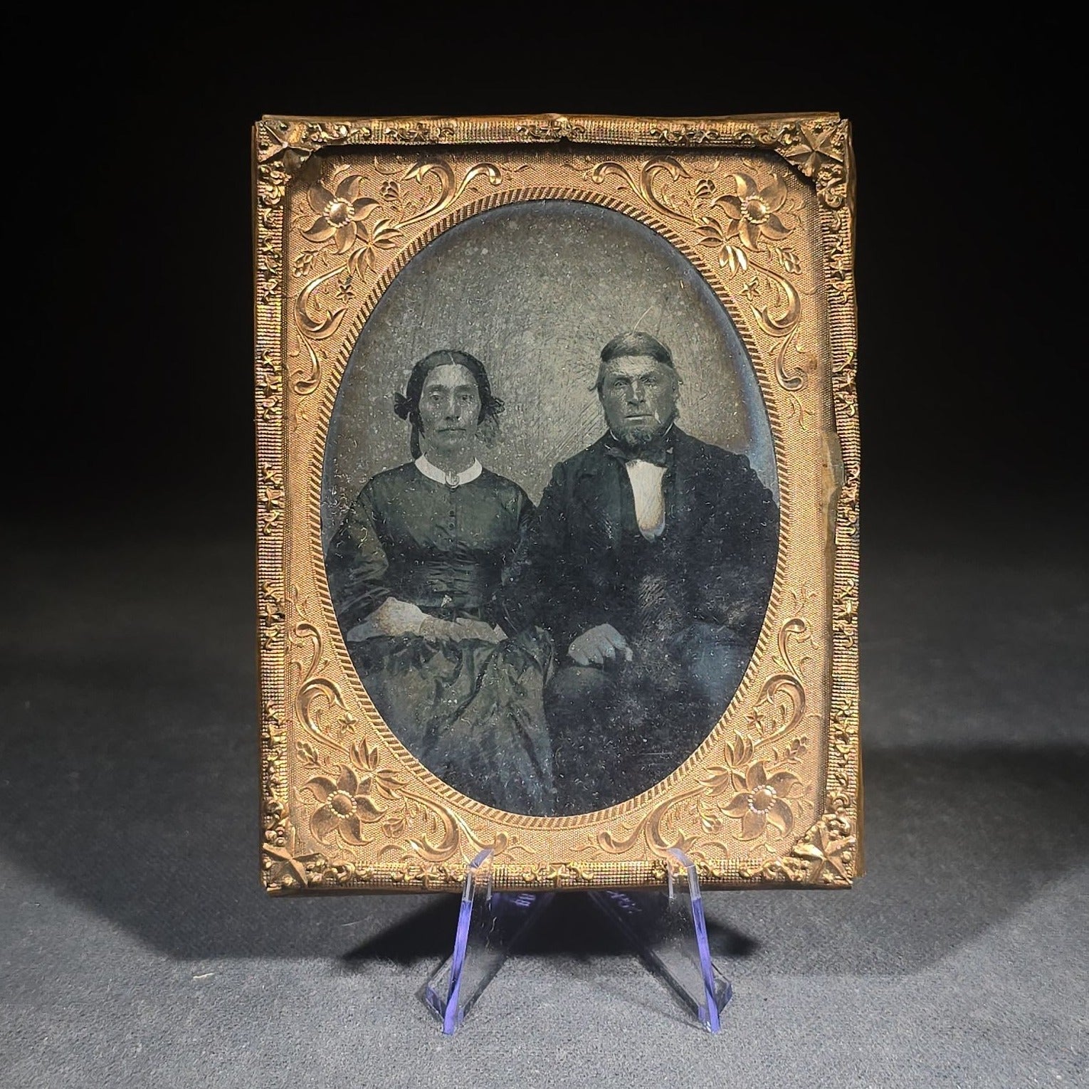Antique Approximately 1/4th Plate Ruby Ambrotype Photograph of a Seated Couple with Embossed Floral Brass Mat, Uncased