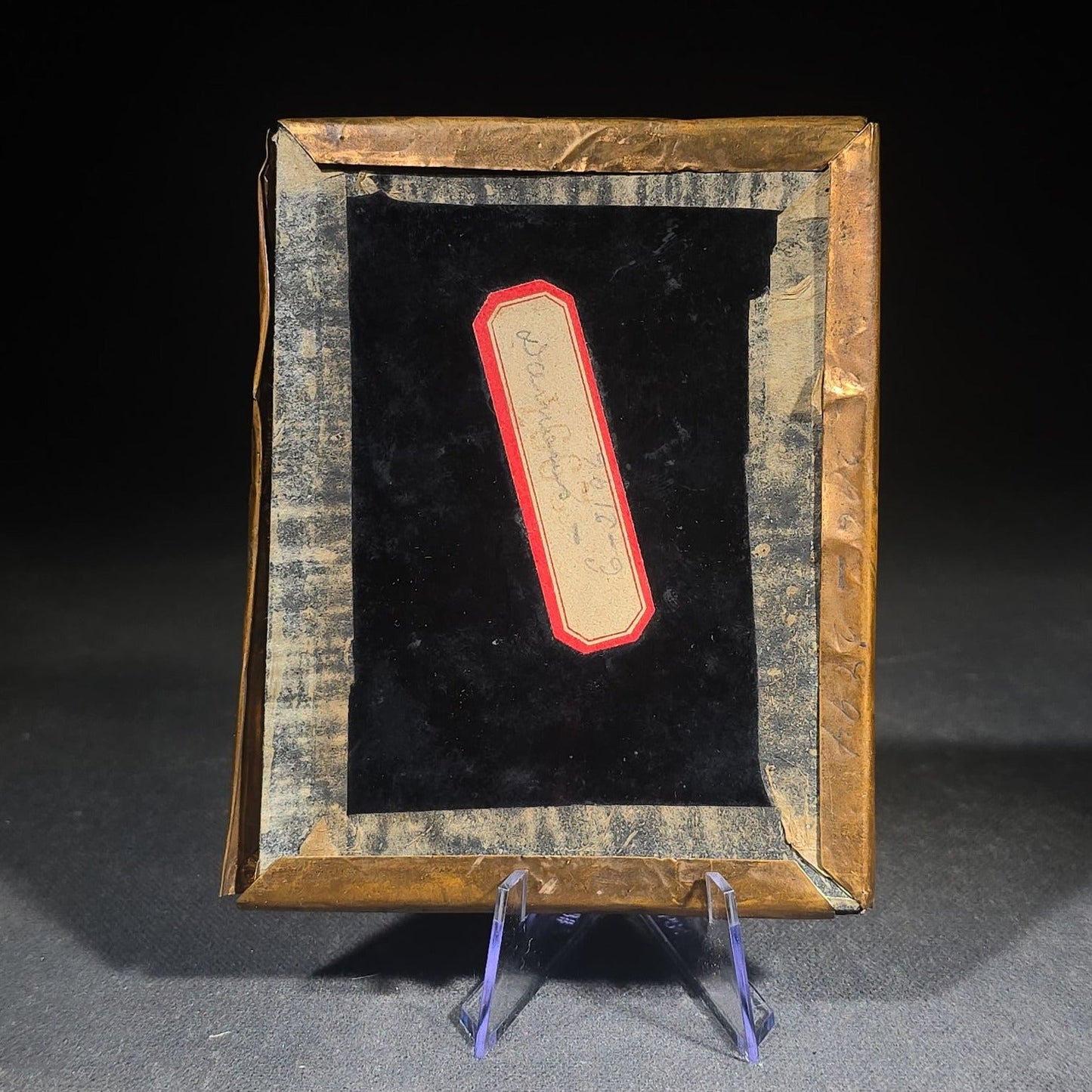 Antique Approximately 1/4th Plate Ruby Ambrotype Photograph of a Seated Couple with Embossed Floral Brass Mat, Uncased