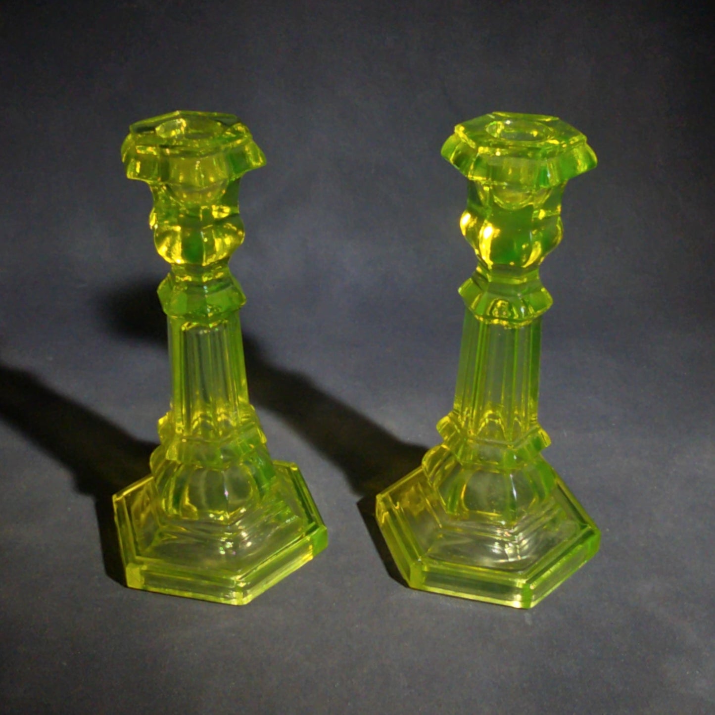 Pair of Antique Uranium Glass Columnar Candlesticks with Hexagonal Bases, UV Reactive