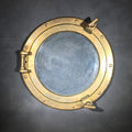 Lot 047 - Vintage Brass Ship's Porthole with Hinged Glass Window and Dog Ear Fasteners, 12" L x 2-3/4" H