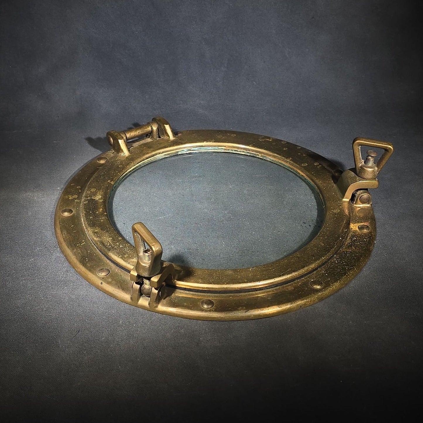 Vintage Brass Ship's Porthole with Hinged Glass Window and Dog Ear Fasteners