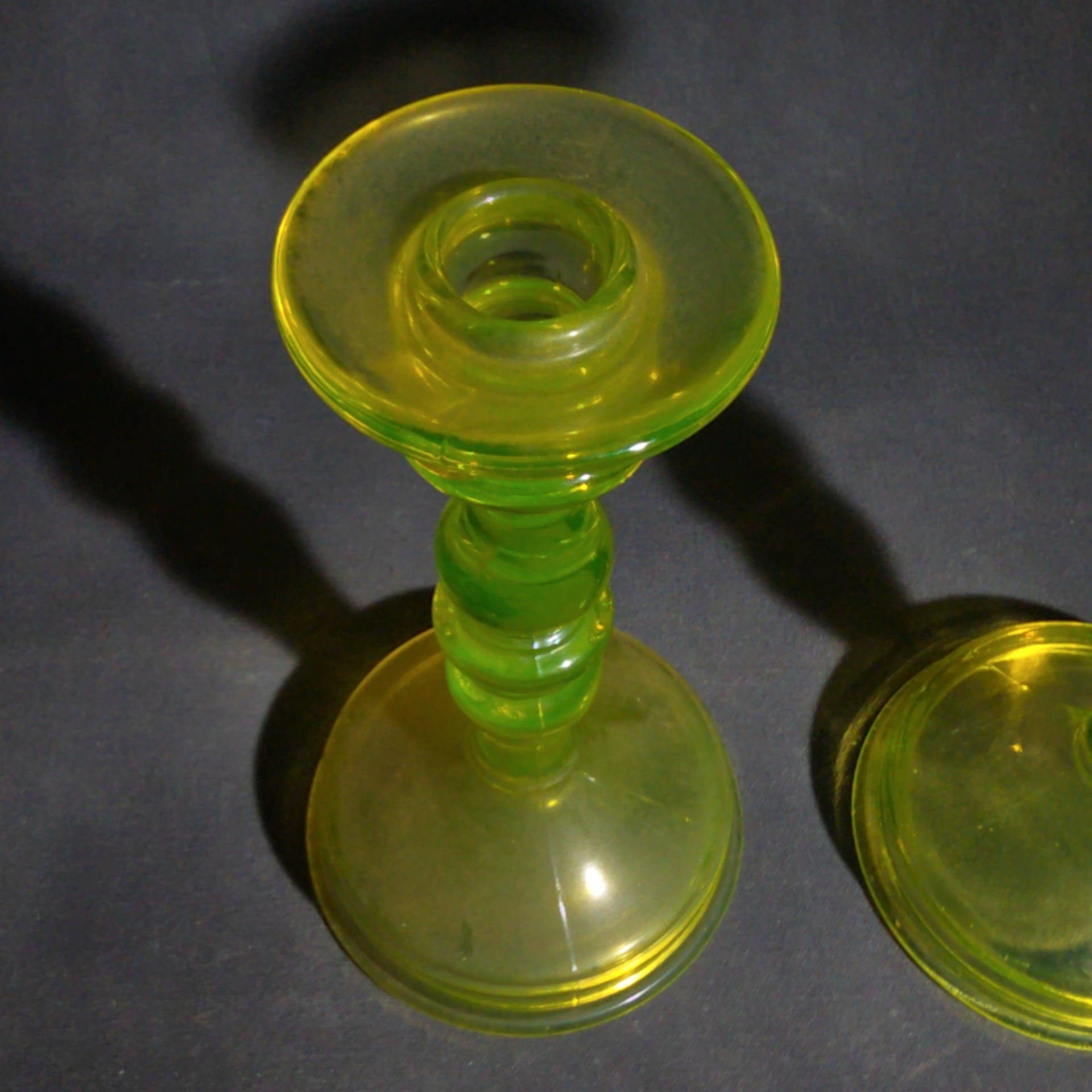 Pair of Antique Uranium Glass Candlesticks with Baluster Stems and Round Bases, UV Reactive
