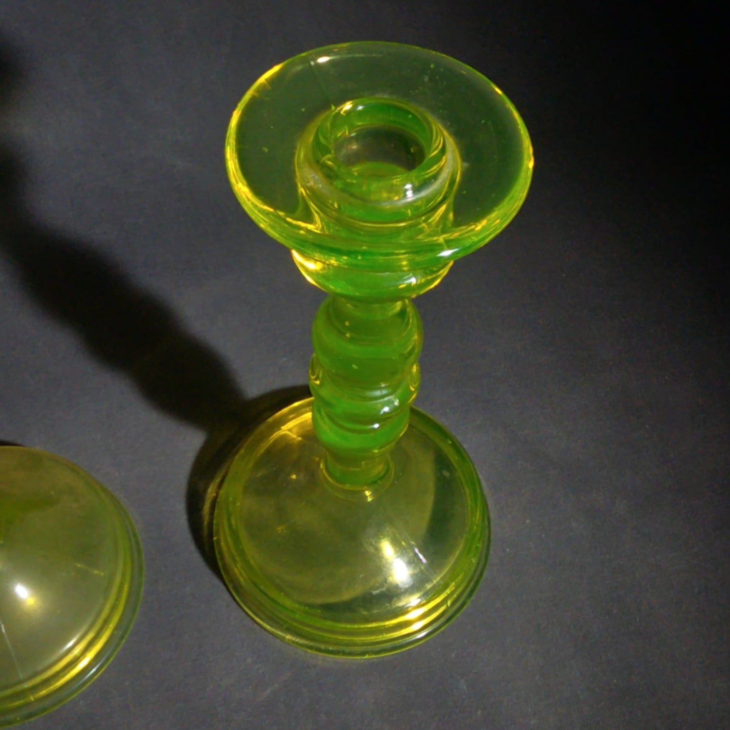 Pair of Antique Uranium Glass Candlesticks with Baluster Stems and Round Bases, UV Reactive