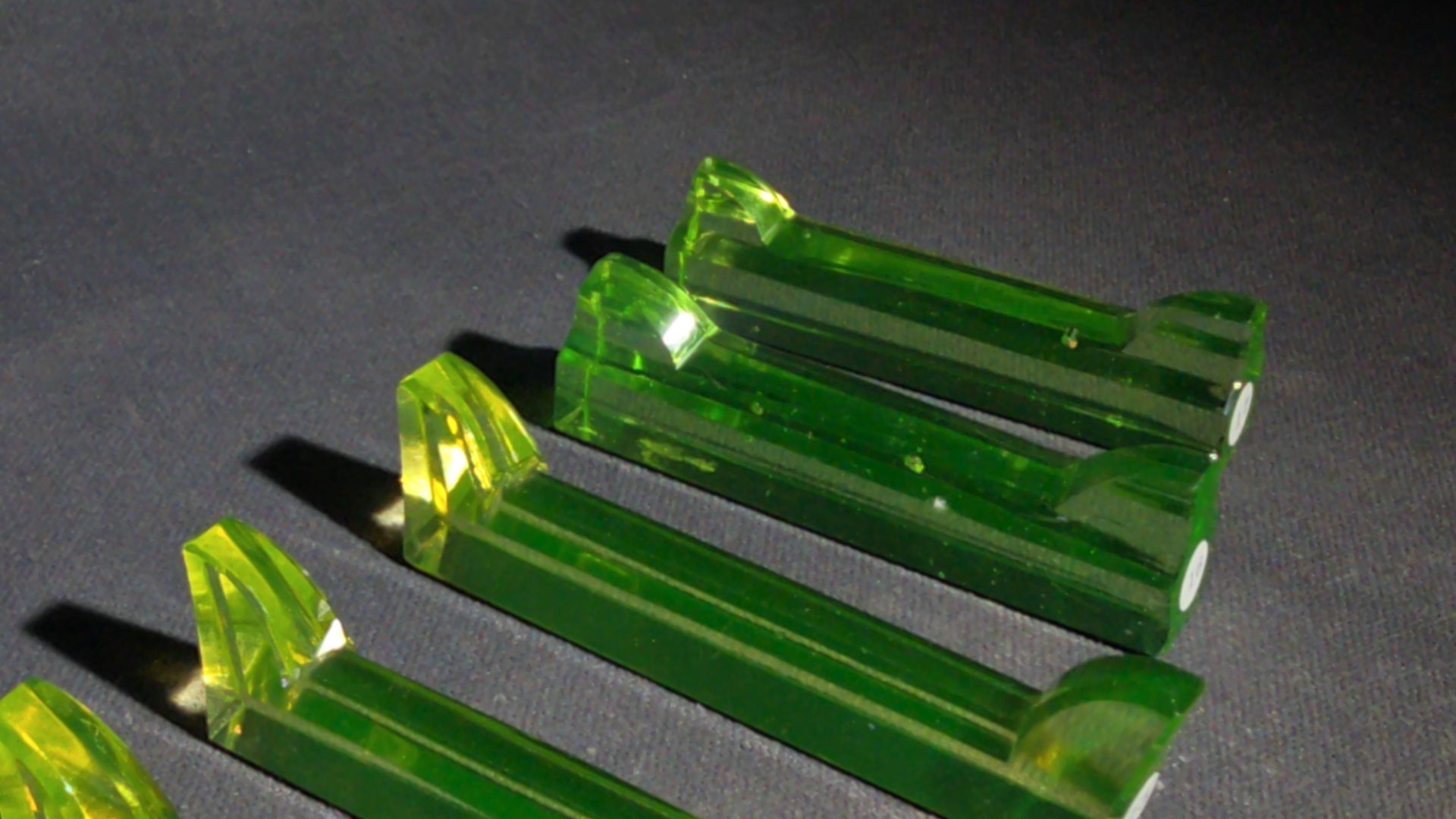 Grouping of 14 Antique Uranium Glass Knife Rests, UV Reactive, Numbered