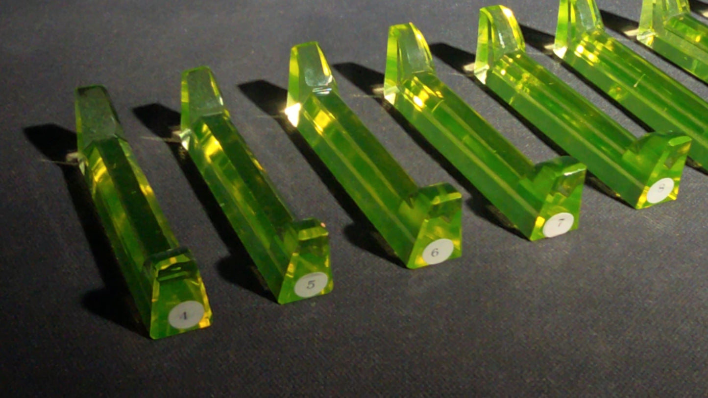 Grouping of 14 Antique Uranium Glass Knife Rests, UV Reactive, Numbered