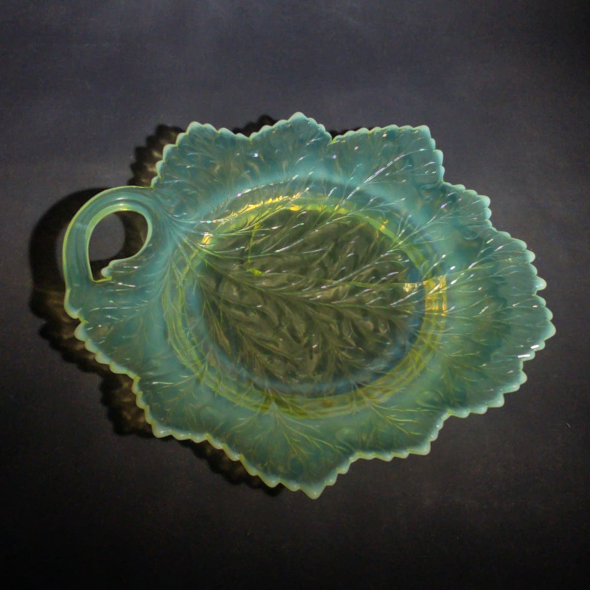 Antique Pressed Uranium Glass Leaf-Form Handled Dish, UV-Reactive, Note Severely Cracked, Poor Condition