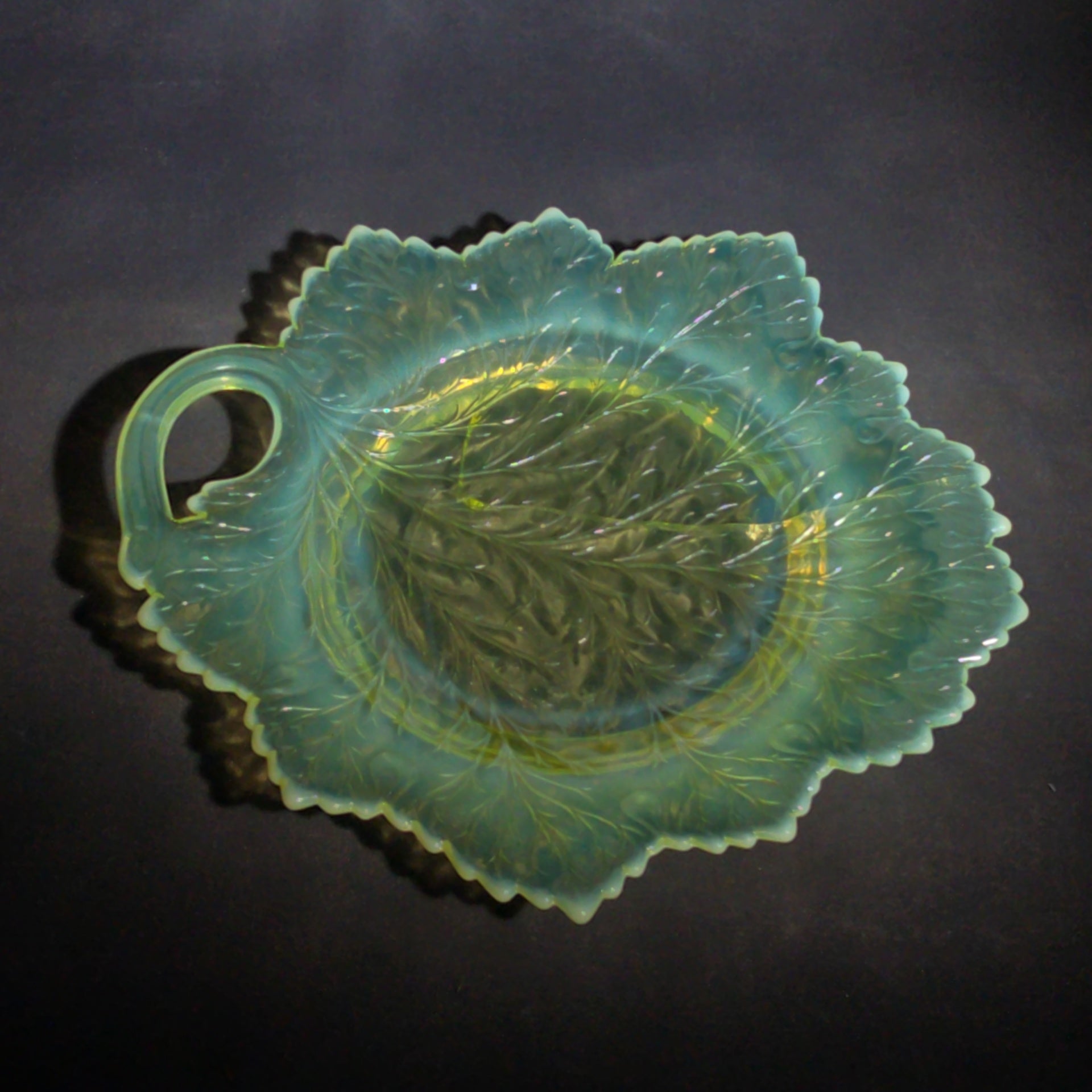 Antique Pressed Uranium Glass Leaf-Form Handled Dish, UV-Reactive, Note Severely Cracked, Poor Condition
