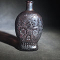 Lot 020 - Vintage Fantasy Figural Skull Purple Glass Bottle, Manufactured by Wheaton, Millville, New Jersey, 5-1/4" H