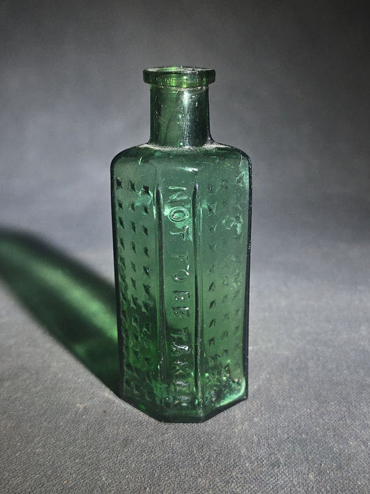 Antique Green Glass Hexagonal Poison Bottle Embossed "Not to Be Taken" with Cross-Hatch Hobnail Pattern and Vertical Ribs