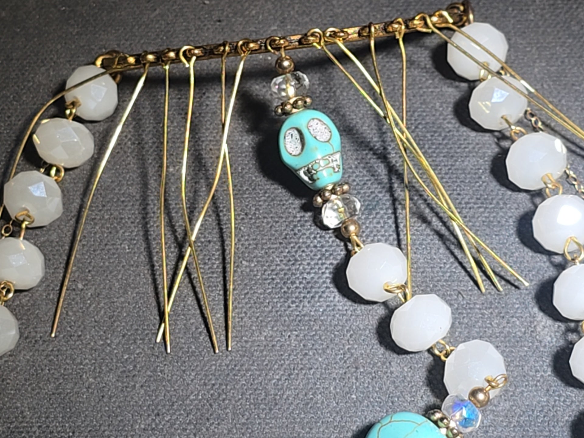 Vintage Beaded Rosary Necklace with Turquoise Skull Beads, Cross Pendant, and Gold-Plated Fringe Elements