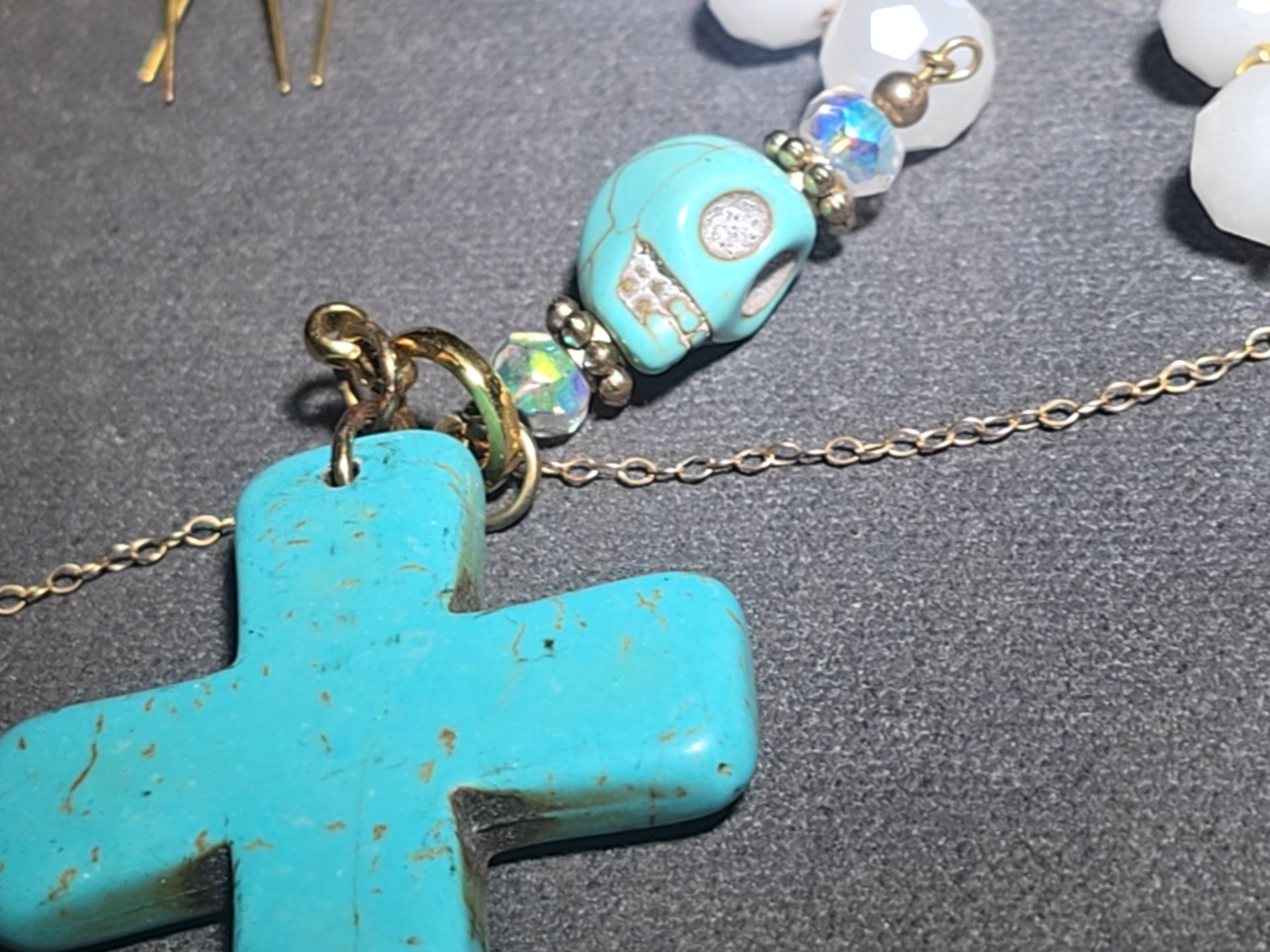 Vintage Beaded Rosary Necklace with Turquoise Skull Beads, Cross Pendant, and Gold-Plated Fringe Elements
