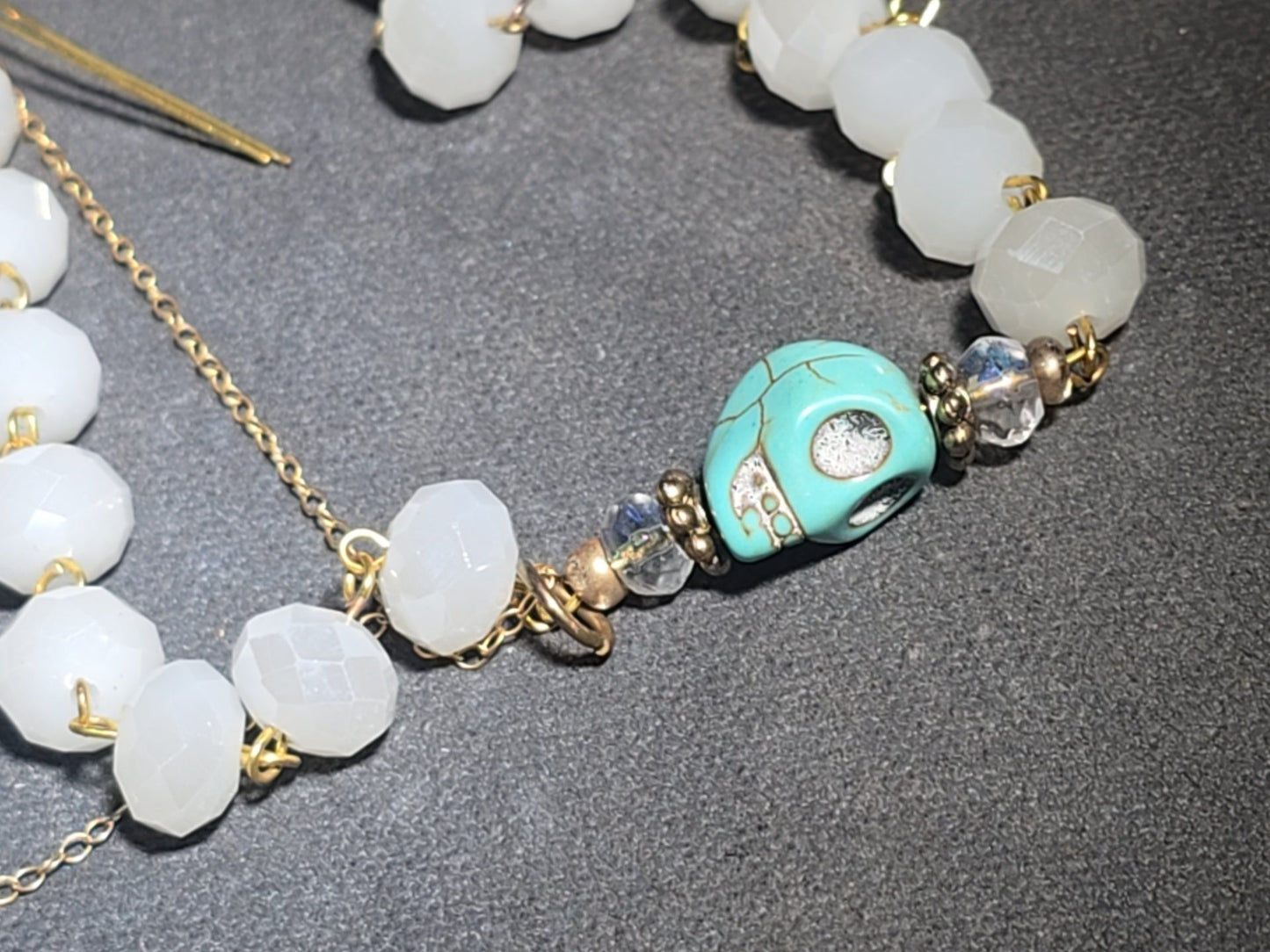 Vintage Beaded Rosary Necklace with Turquoise Skull Beads, Cross Pendant, and Gold-Plated Fringe Elements
