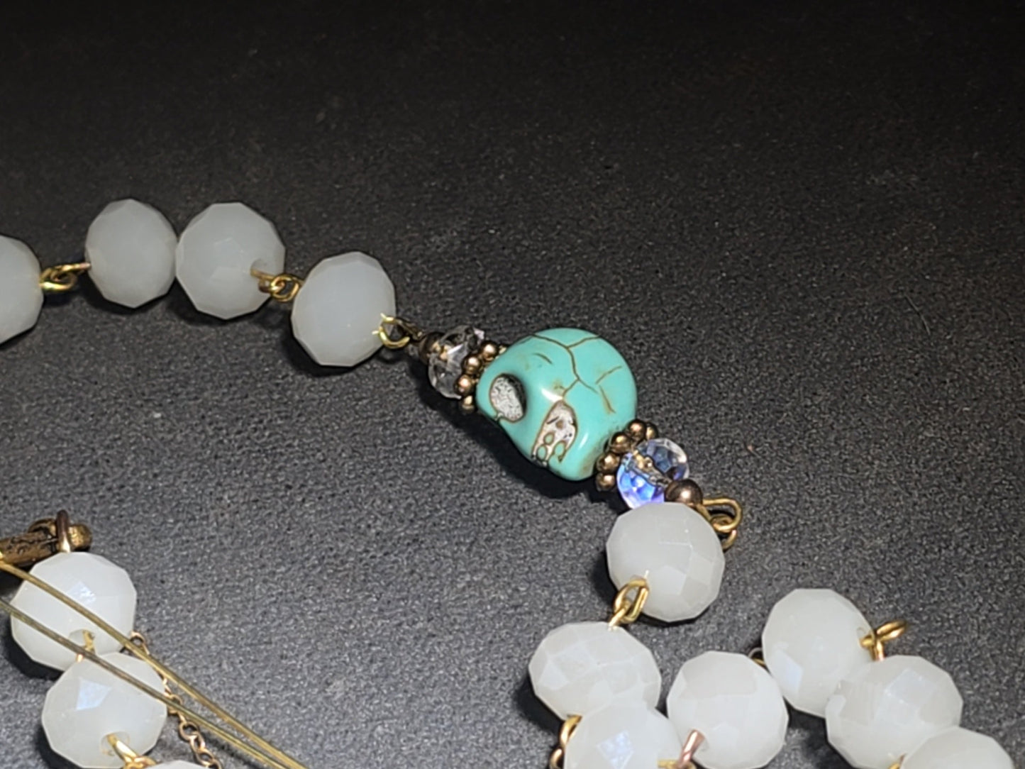 Vintage Beaded Rosary Necklace with Turquoise Skull Beads, Cross Pendant, and Gold-Plated Fringe Elements