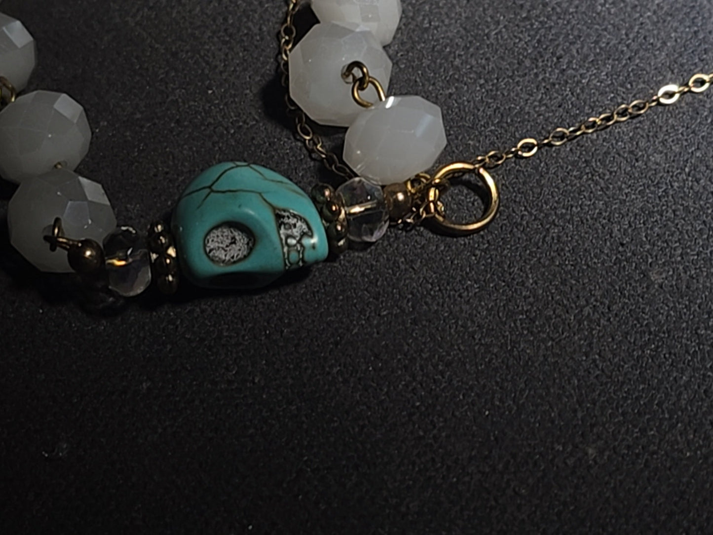 Vintage Beaded Rosary Necklace with Turquoise Skull Beads, Cross Pendant, and Gold-Plated Fringe Elements