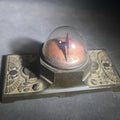 Lot 024 - Antique Thermo Vane Dome Desk Thermometer with Egyptian Revival Winged Sun Disc and Lotus Motif Base, Manufactured by Schaeffer & Budenberg, Brooklyn, New York, 6-3/8" L x 3" H